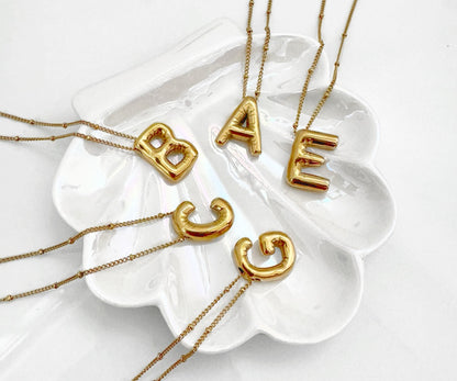 Collar Inicial Globo